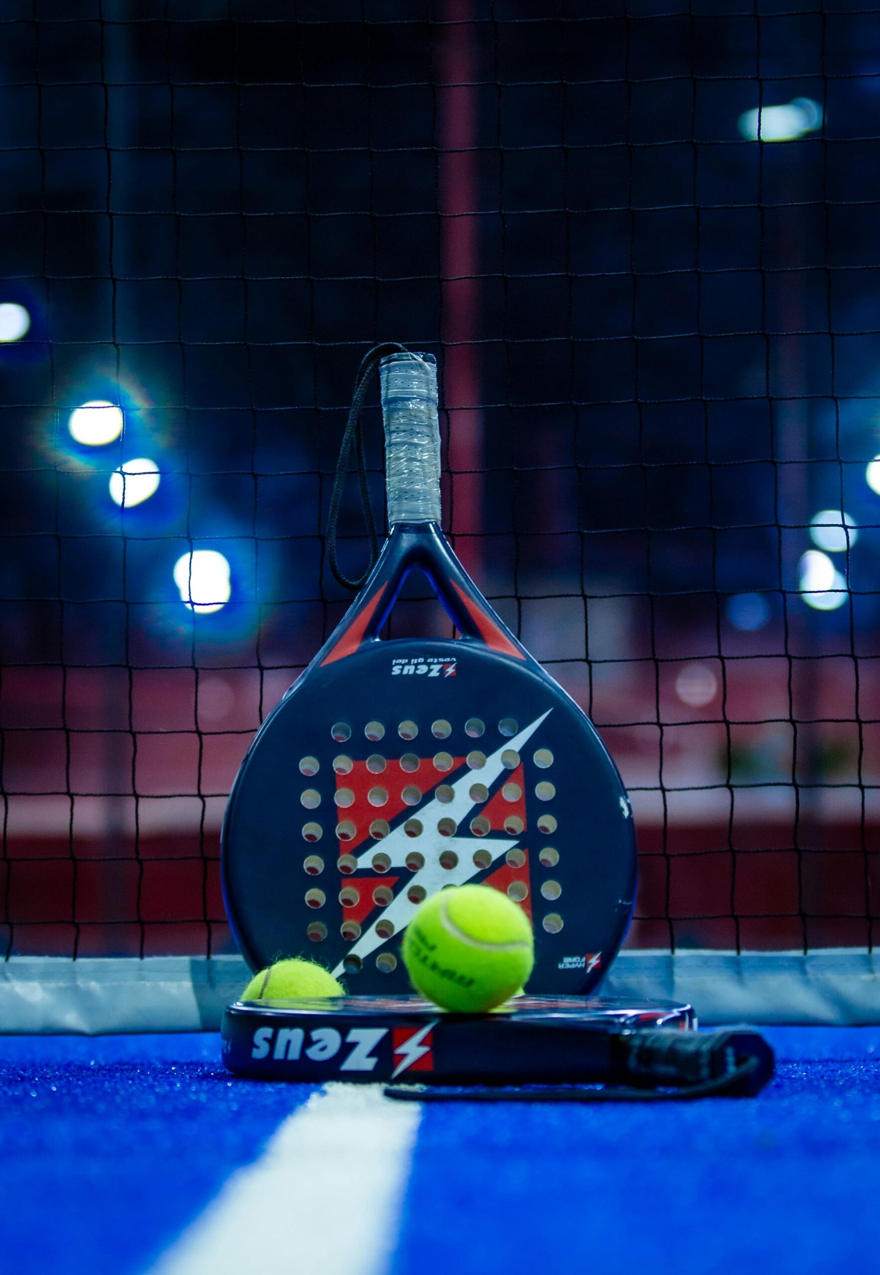 A player hitting a padel smash overhead